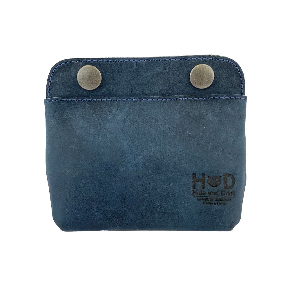 Front view of Hide & Drink Double Snap Pouch in a vibrant tan color, showcasing its use for cash and cards. This product is handcrafted from full grain leather in La Antigua Guatemala for exceptional quality.