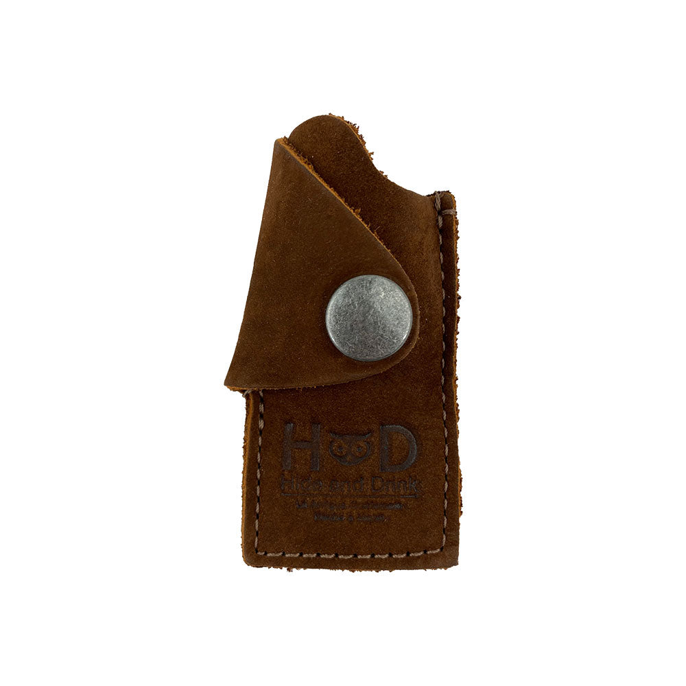 Front view of the Hide & Drink Lighter Protective Case showcasing its craftsmanship in full grain leather, known for its durability and style. Artisan crafted in La Antigua Guatemala & Oaxaca Mexico. Keywords: Lighter Protective Case, Full Grain Leather, Artisan.