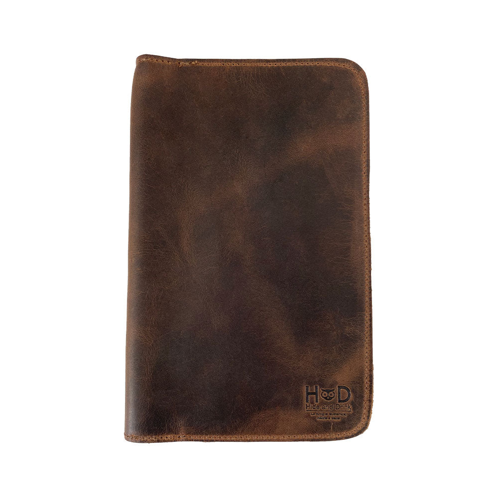 Front view of the Journal Cover for Moleskine Cahier L (5 x 8.25 in.) by Hide & Drink. This stylish refillable journal cover is ideal for large size (5 x 8.25 in.) notebooks and crafted from full grain leather, representing small batch production and artisan quality.