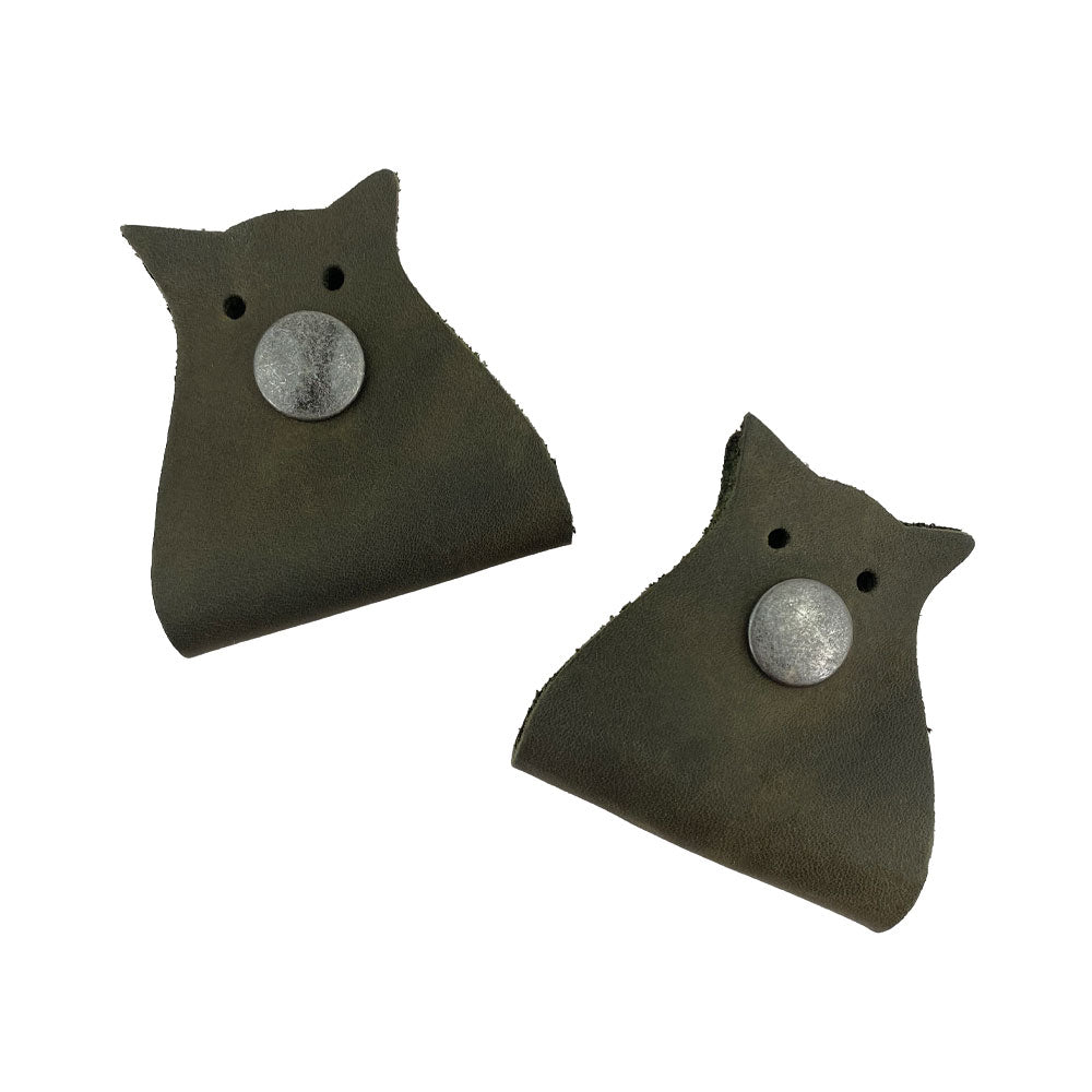 Chic Owl Shaped Cord Keeper (2-Pack) by Hide & Drink made from full grain leather in a dark green hue, perfect for organizing cords. Owl Shaped Cord Keeper (Cord Clam) 2-Pack. Full Grain Leather, StockyardX, Small Batch Production, Hand Cut, Hand Sewn, Fire Branded, Artisan, Handmade in La Antigua Guatemala & Oaxaca Mexico.