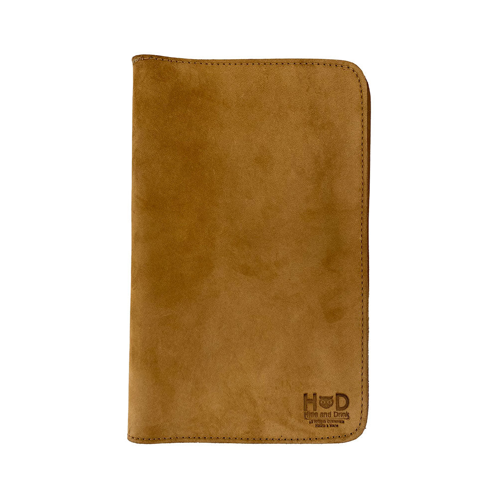 Back view of a tan Journal Cover for Moleskine Cahier L (5 x 8.25 in.) by Hide & Drink. This handmade protector for large size (5 x 8.25 in.) notebooks reflects artisan quality, being crafted from durable full grain leather.