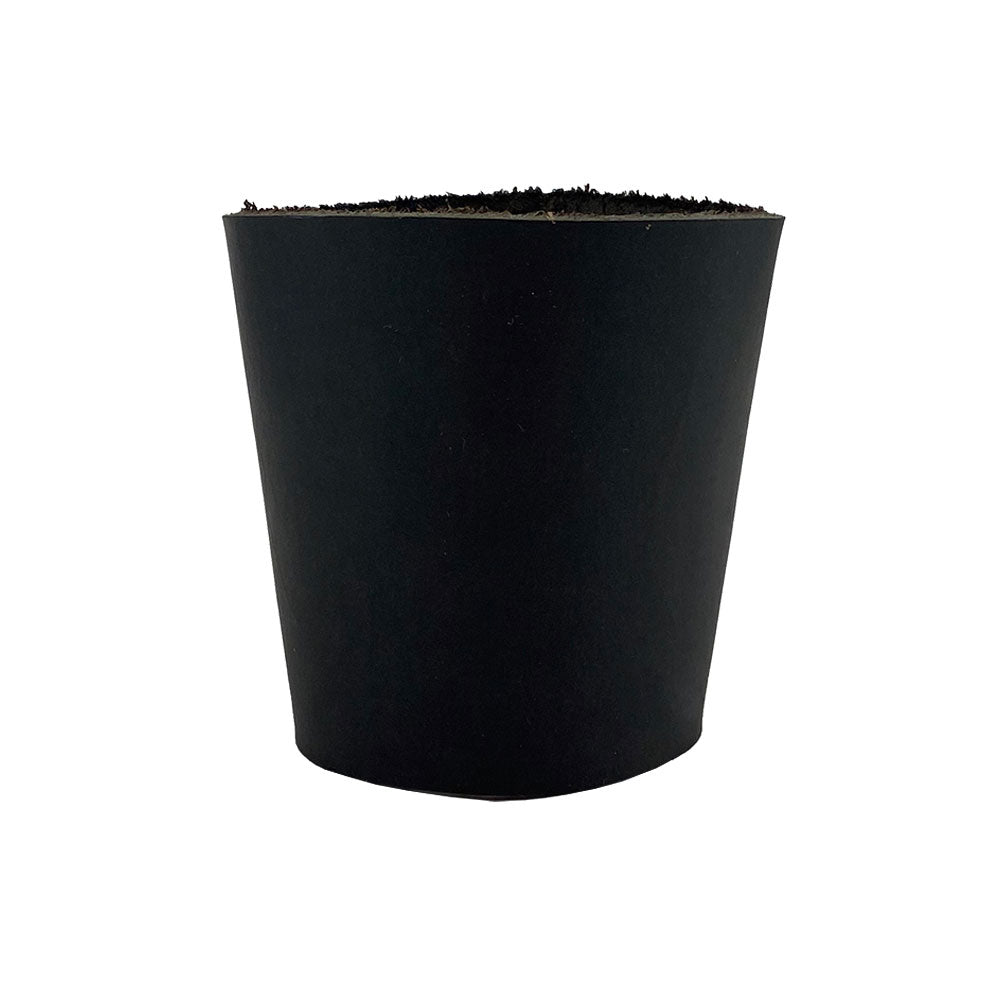 A sleek black leather Pint Sleeve by Hide & Drink, perfect for bar pub style events. Its sturdy leather provides natural insulation, while the brass metal rivets enhance its classic look, representing artisan craftsmanship from La Antigua Guatemala & Oaxaca Mexico.