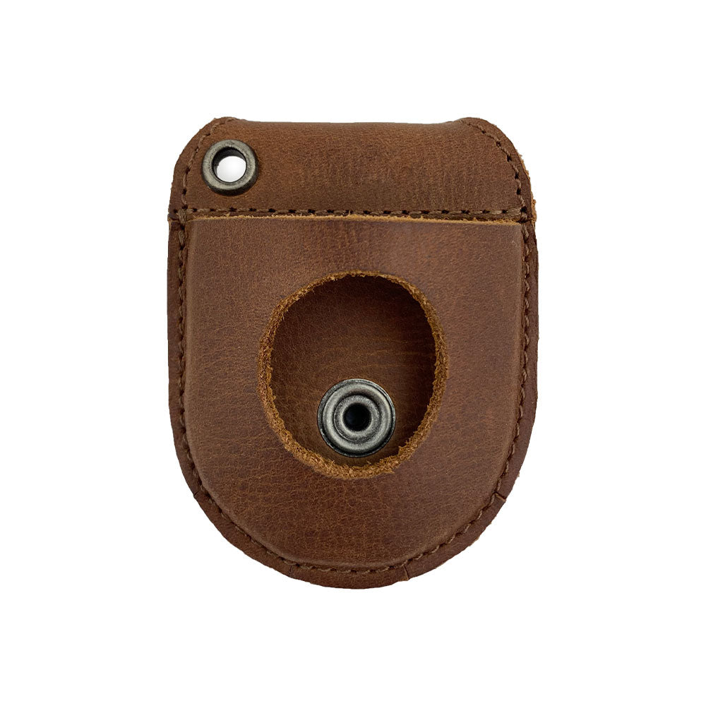 Hide & Drink Pocket Watch Holder and Case shown in a brown leather finish, designed for pocket watch protection. This Pocket Watch Case is a rustic protector holder made of full grain leather, featuring small batch production, hand cut, hand sewn, and fire branded craftsmanship. Artisan quality, handmade in La Antigua Guatemala & Oaxaca Mexico.