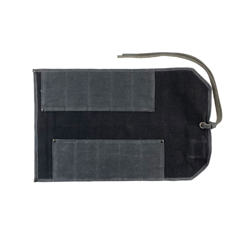 Hide & Drink Tool Roll features a classy small tool roll-up bag with 10 slots, crafted from quality full grain leather. Ideal as a portable carry-on pouch for organizing woodworking tools, it supports your workshop storage needs. Each item is handmade with care in La Antigua Guatemala & Oaxaca Mexico.