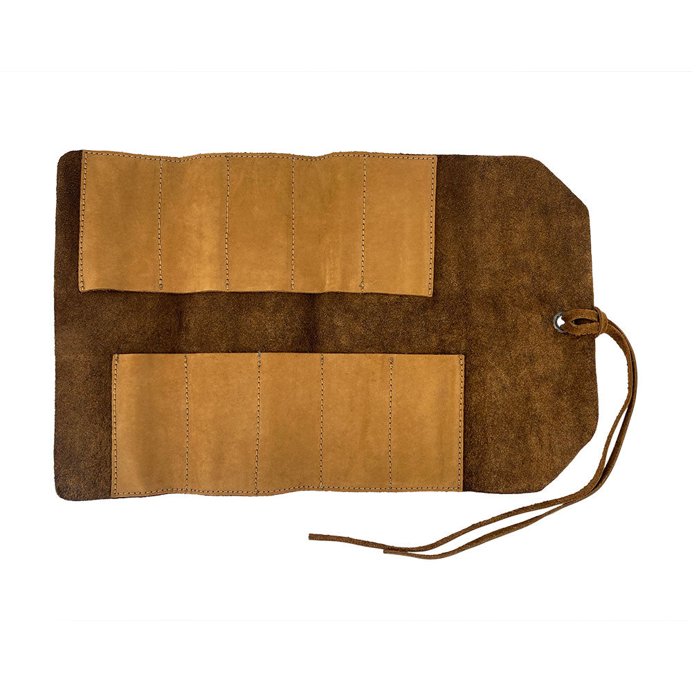 Hide & Drink Tool Roll presents a well-crafted small tool roll-up bag with 10 slots, made from fine full grain leather. This portable carry-on pouch is perfect for organizing woodworking tools, enhancing workshop storage capabilities. Proudly handcrafted in La Antigua Guatemala & Oaxaca Mexico, reflecting artisan quality.