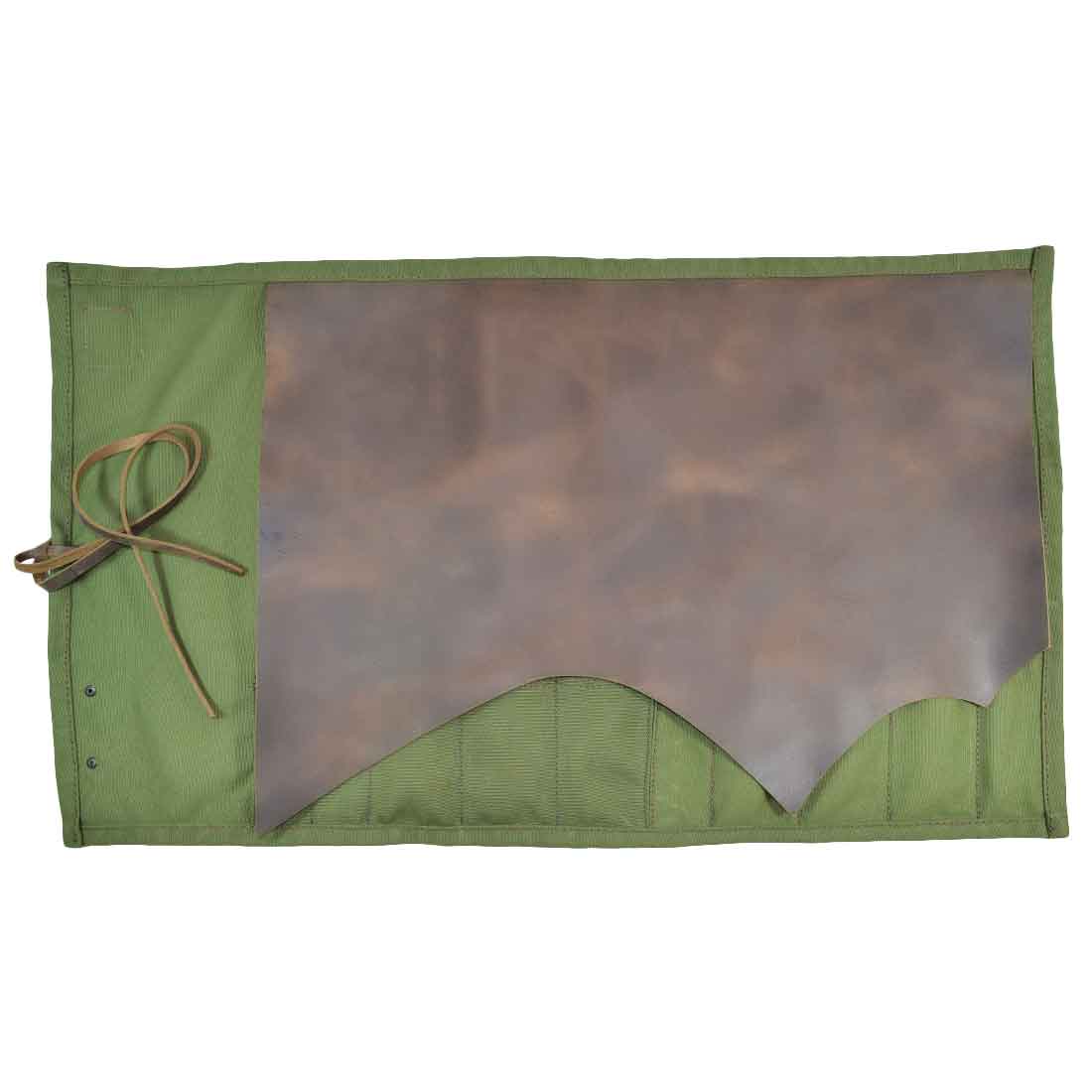 Hide & Drink's Knife Roll (10 Pockets) rolled up tightly, made from durable waxed canvas and full grain leather, perfect for travel. This all purpose knife roll reflects artisan skills and quality, handmade in La Antigua Guatemala & Oaxaca Mexico.
