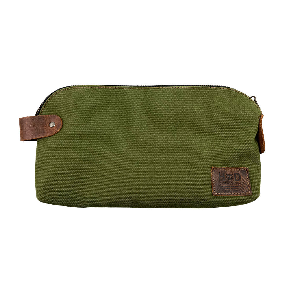 Dopp Kit Utility Bag by Hide & Drink showcasing its adaptability for on-the-go organization. This artisan-crafted Dopp Kit Utility Bag is made from full grain leather, emphasizing small batch production methods with hand cut and hand sewn craftsmanship, handmade in La Antigua Guatemala & Oaxaca Mexico.
