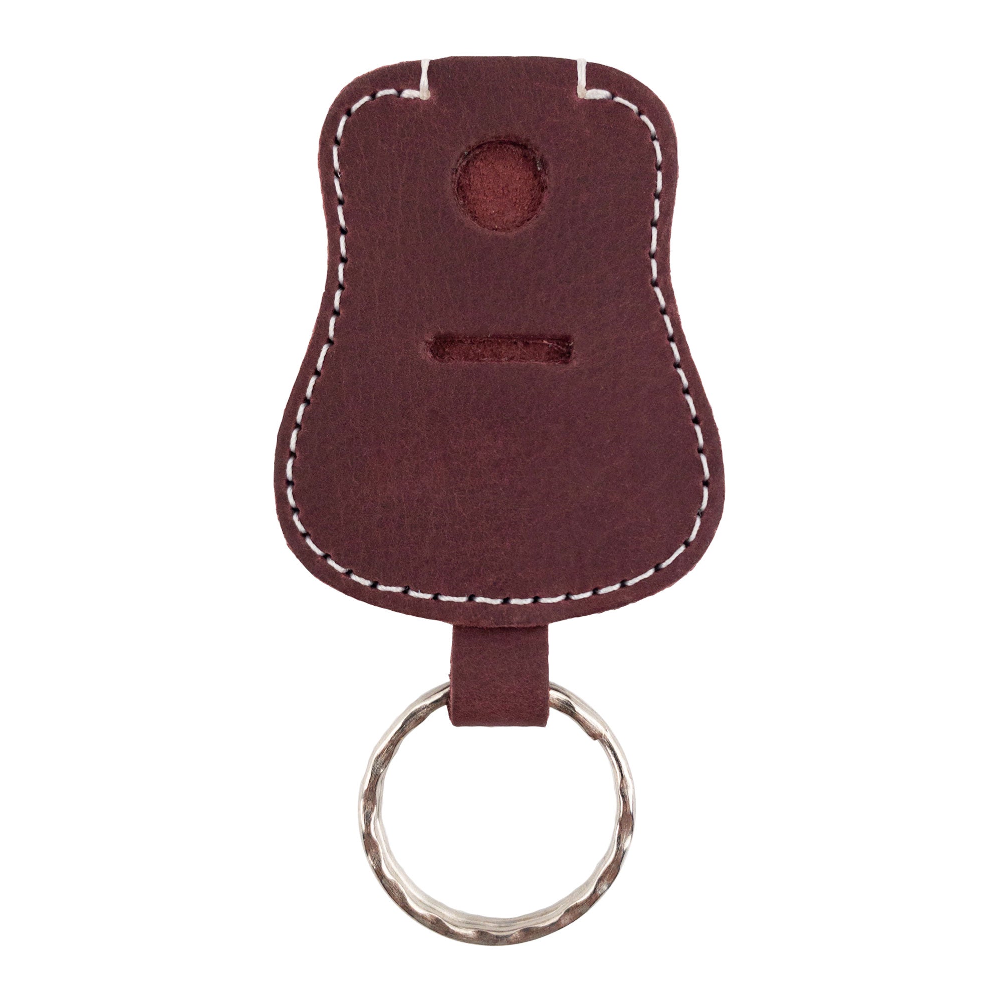 Guitar Keychain by Hide & Drink with unique character, demonstrating its pouch design for quick access. This handcrafted key holder, made from Full Grain Leather, reflects artisan skills and small batch production from La Antigua Guatemala & Oaxaca Mexico.
