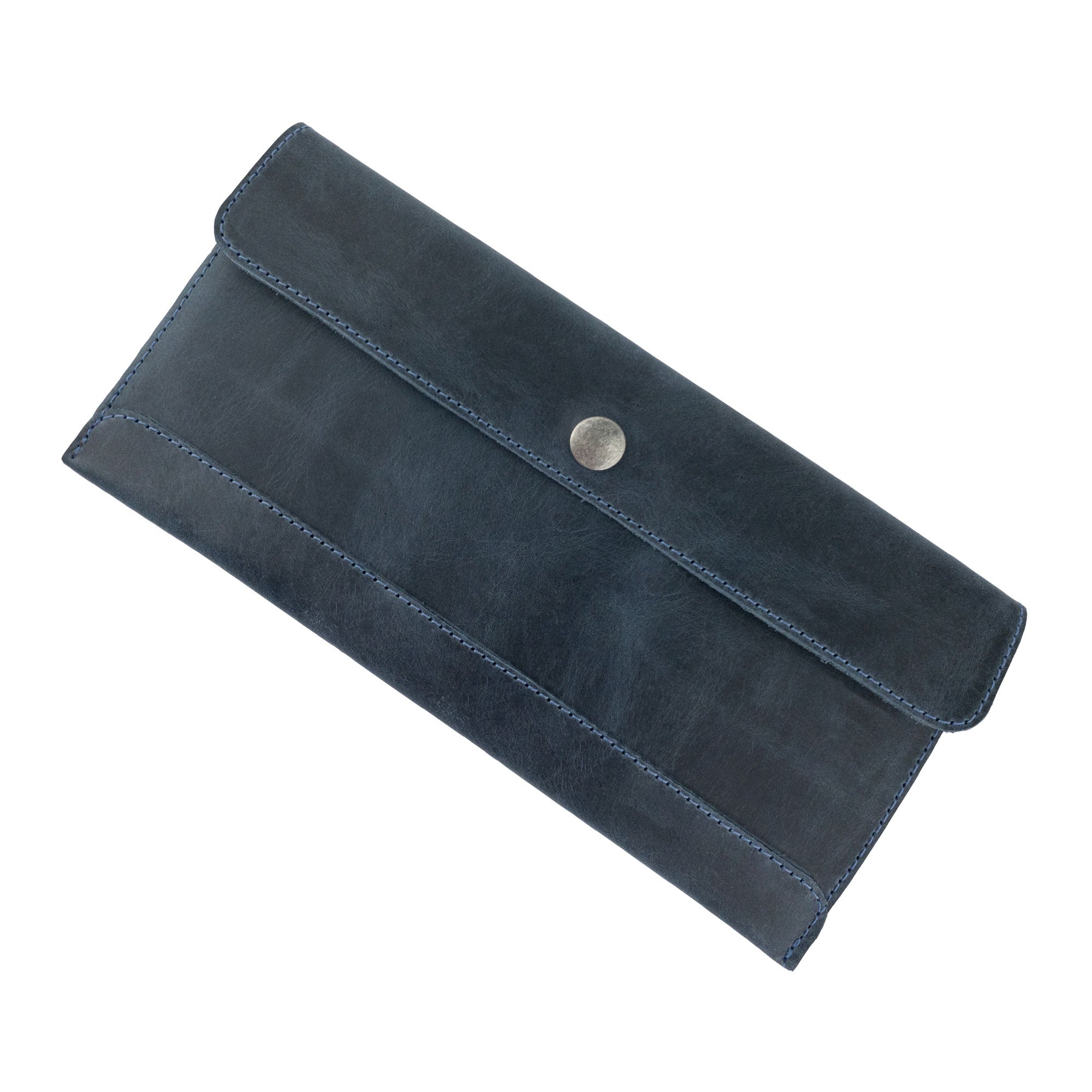 Hide & Drink's navy blue Travel Hand Wallet featuring a smooth texture and stylish design, made from premium Full Grain Leather. This Travel Wallet reflects Small Batch Production and artisan techniques in La Antigua Guatemala & Oaxaca Mexico.