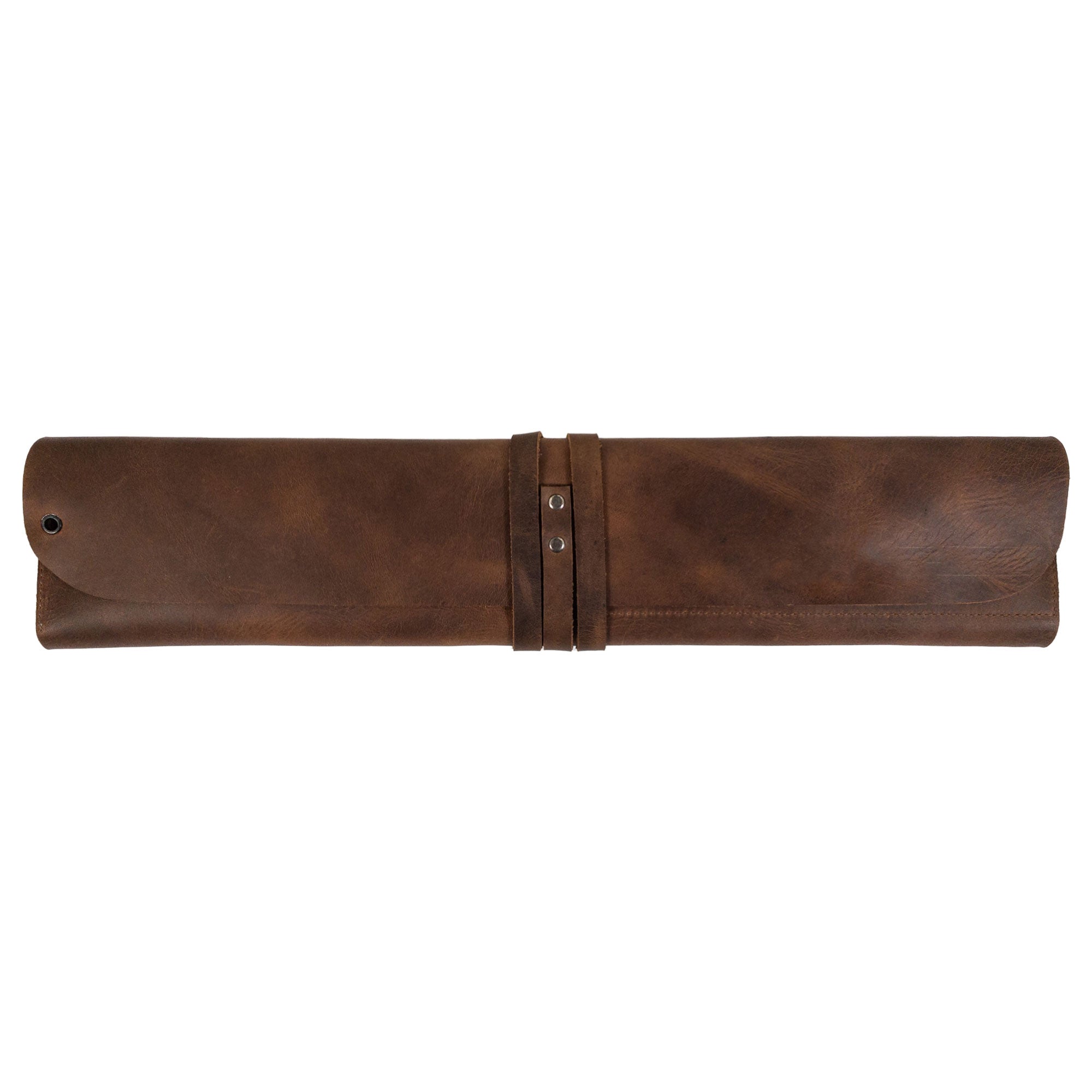 Hide & Drink’s Drumstick Roll with Slot for Drum Key made from Full Grain Leather showcases a sleek design, perfect for drummers seeking style and functionality. This artisan piece reflects small batch production, hand cut and hand sewn craftsmanship, infused with fire branded details, all handmade in La Antigua Guatemala & Oaxaca Mexico.