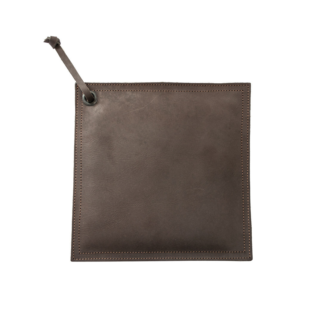 Hide & Drink Pot Pad, luxurious olive green leather highlighting craftsmanship. Perfect as a pot pad, this durable handmade piece is designed for kitchen use.