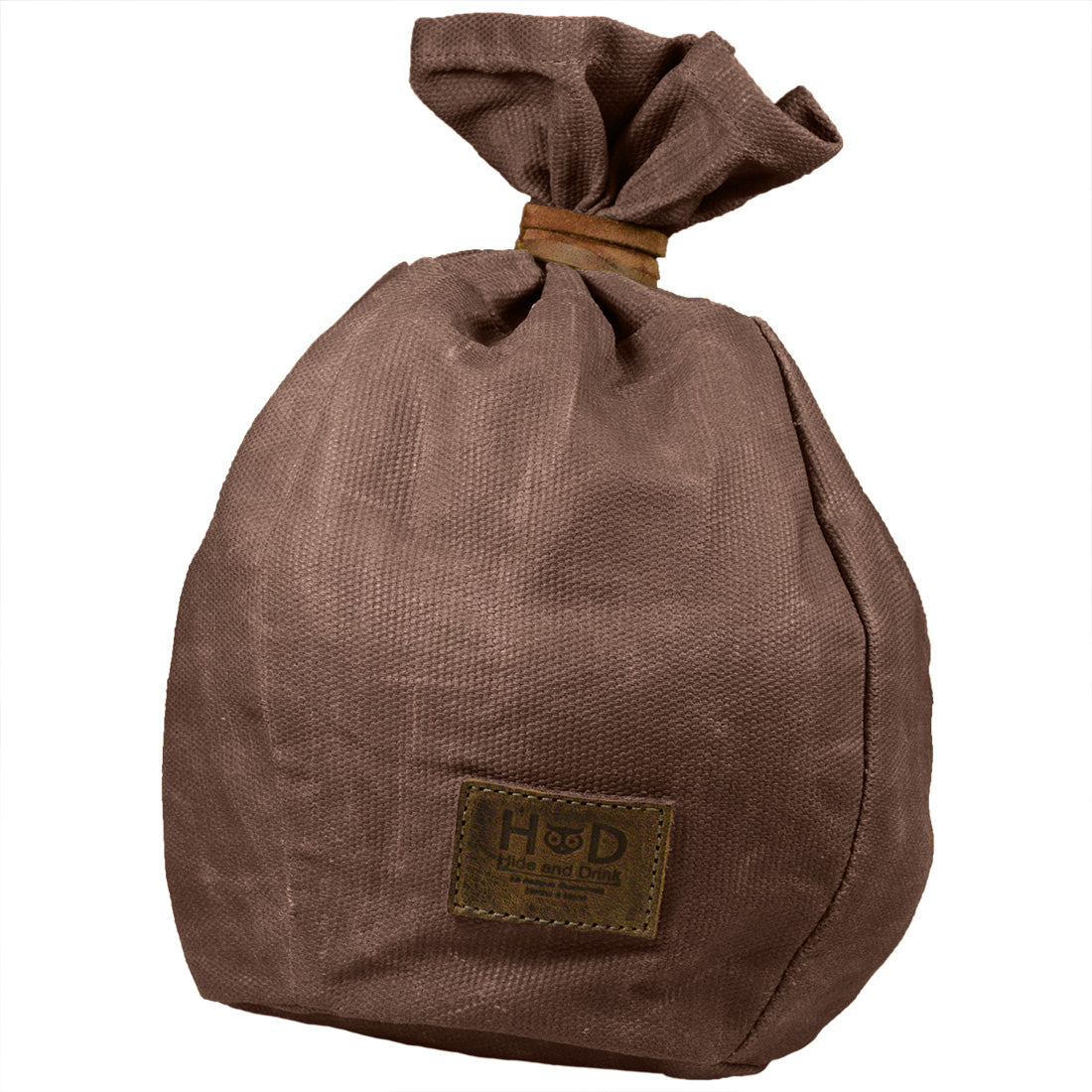 Bushcraft Tinder Bag by Hide & Drink, crafted with high-quality Waxed Canvas. This water resistant outdoor pouch is perfect for camping accessories, representing small batch production and meticulous hand cut and hand sewn craftsmanship. Handmade in La Antigua Guatemala & Oaxaca Mexico.