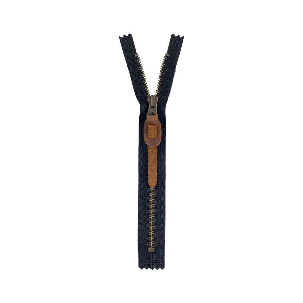Rustic Zipper Pull Replacement by Hide & Drink with a sleek design, part of a set of 6. Ideal for use on backpacks, jackets, wallets, luggage, and bags, this full grain leather pull adds a touch of rustic elegance. Handmade with care, every piece is hand cut, hand sewn, and fire branded in La Antigua Guatemala & Oaxaca Mexico.