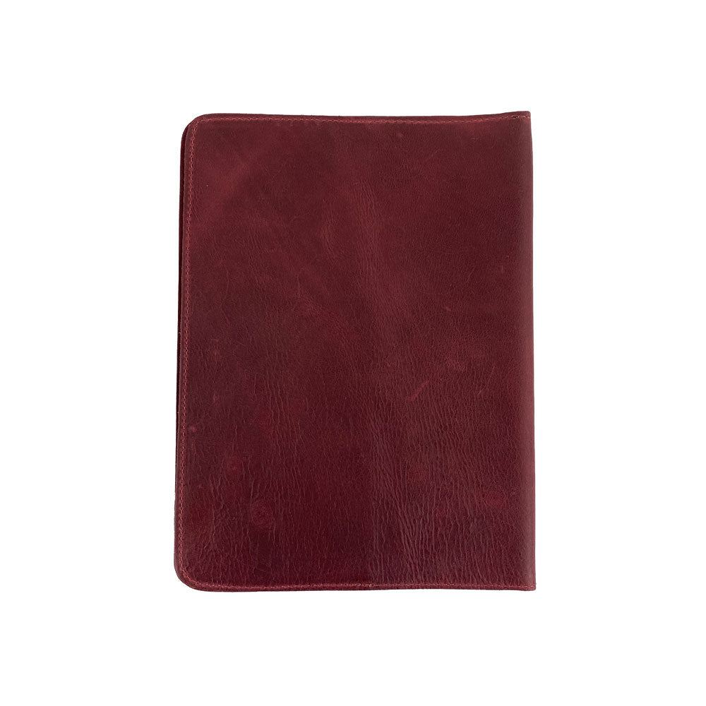 Back of the brown leather Full Grain Leather Journal Cover for Moleskine Cahier XL (7.5 x 9.75 in.) by Hide & Drink, showcasing its quality and artisanal touches. Ideal for those who appreciate unique notebook sleeves crafted by hand.