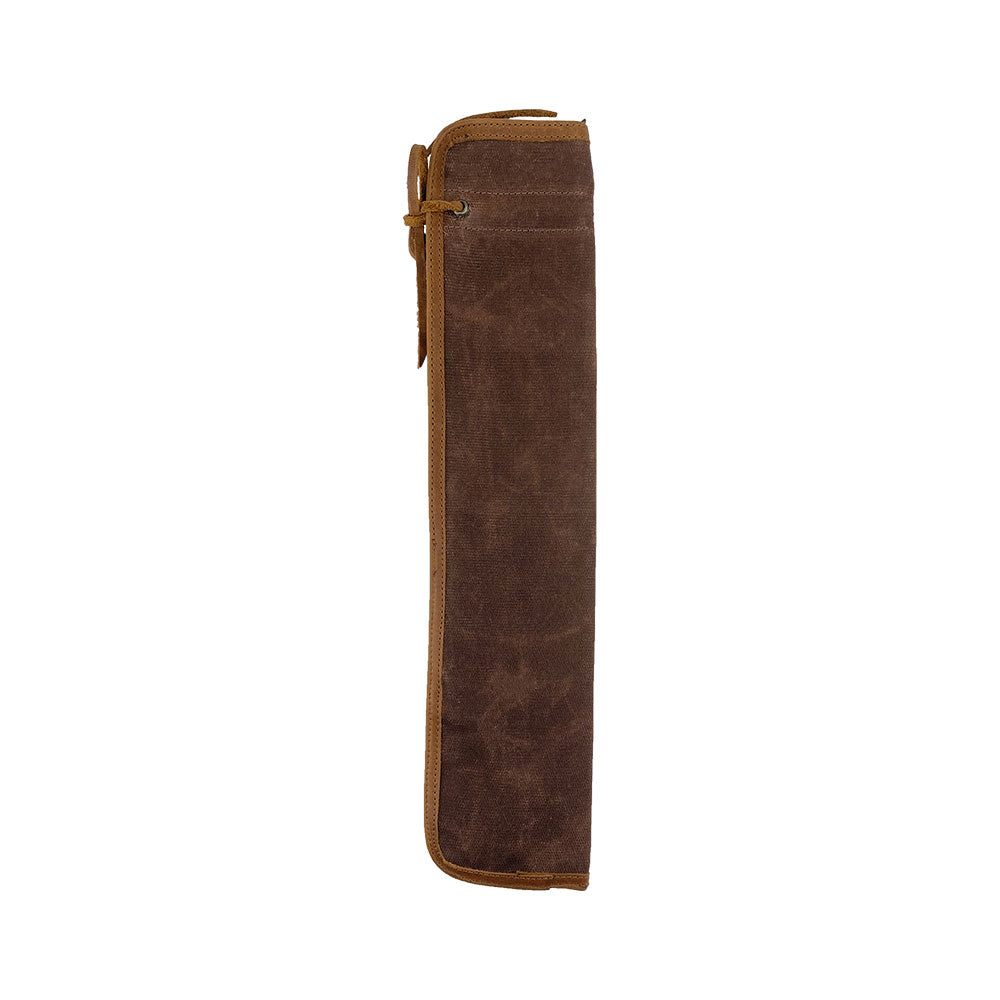 Side view of the brown Hide & Drink Drummstick Bag, emphasizing its sleek and functional design. This Waxed Canvas & Full Grain Leather Drumstick Bag Holder is tailored for musicians, showcasing the artisan craftsmanship inherent to small batch production in La Antigua Guatemala & Oaxaca Mexico.
