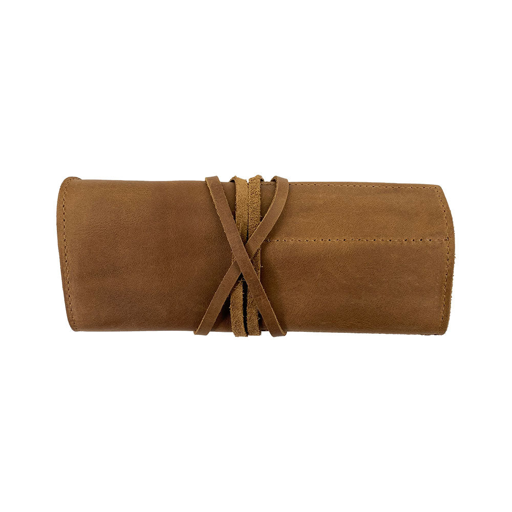 Hide & Drink Multi Purpose Pencil Roll shown displaying its compartments, perfect for fitting a variety of tools. This organizer represents excellence in craftsmanship, made from durable full grain leather.
