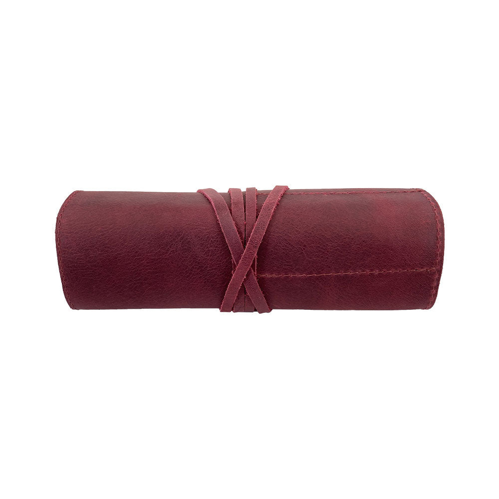 Hide & Drink Multi Purpose Pencil Roll presented with compartments ready for organizing your tools. A handmade leather pouch that captures rustic charm and artisan craftsmanship for all your crafting and work needs.