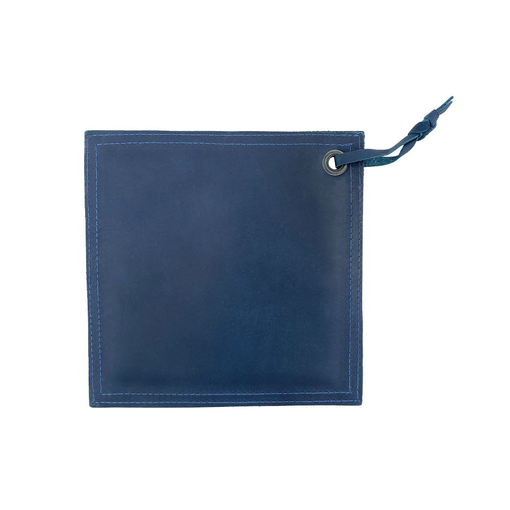 Back view of the Hide & Drink Pot Pad, illustrating its durable leather construction. Ideal for any kitchen, it combines functionality with a chic rustic look.