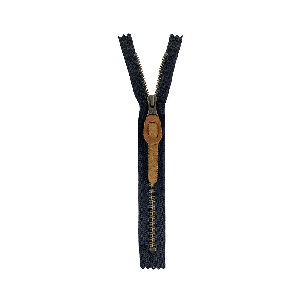 Versatile Rustic Zipper Pull Replacement from Hide & Drink, made of durable full grain leather. This zipper pull is part of a 6 pack set, perfect for use on backpacks, jackets, wallets, luggage, and bags. Artisan produced and fire branded, it embodies the craftsmanship of La Antigua Guatemala & Oaxaca Mexico.