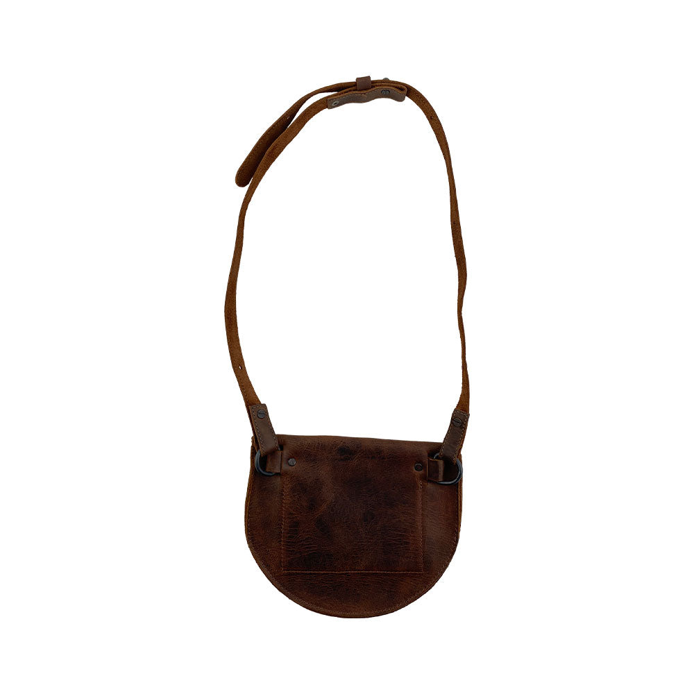 Back view of the Hip and Shoulder Bag from Hide & Drink, emphasizing its beautiful Full Grain Leather finish and artisanal quality. This bag represents Small Batch Production, being both hand cut and hand sewn, with a distinctive fire branded design. Handmade in La Antigua Guatemala & Oaxaca Mexico.