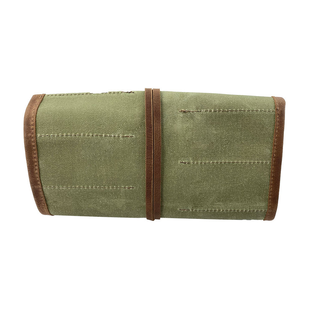 Hide & Drink Tool Roll presents a refined small tool roll-up bag with 10 slots, designed from quality full grain leather. This portable carry-on pouch is perfect for organizing woodworking tools, elevating your workshop storage. Each artisan item is hand cut and sewn in La Antigua Guatemala & Oaxaca Mexico.