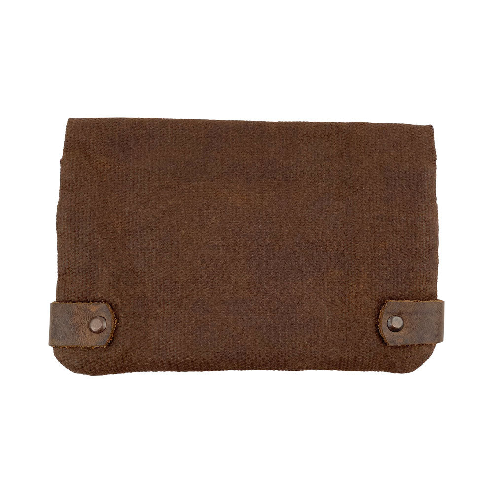 Back view of the dark brown Hide & Drink Tobacco Pouch Waxed Canvas, highlighting its durable and stylish design. This travel essential is perfect for tobacco storage and field notes, reflecting artisan craftsmanship and handmade excellence.