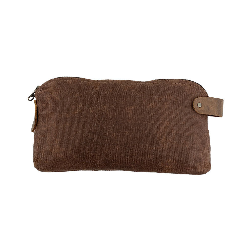 Dopp Kit Utility Bag by Hide & Drink demonstrating a stylish design with practicality in mind. This artisan Dopp Kit Utility Bag serves as a versatile travel solution, made from high-quality full grain leather with emphasis on hand cut and hand sewn techniques, handmade in La Antigua Guatemala & Oaxaca Mexico.