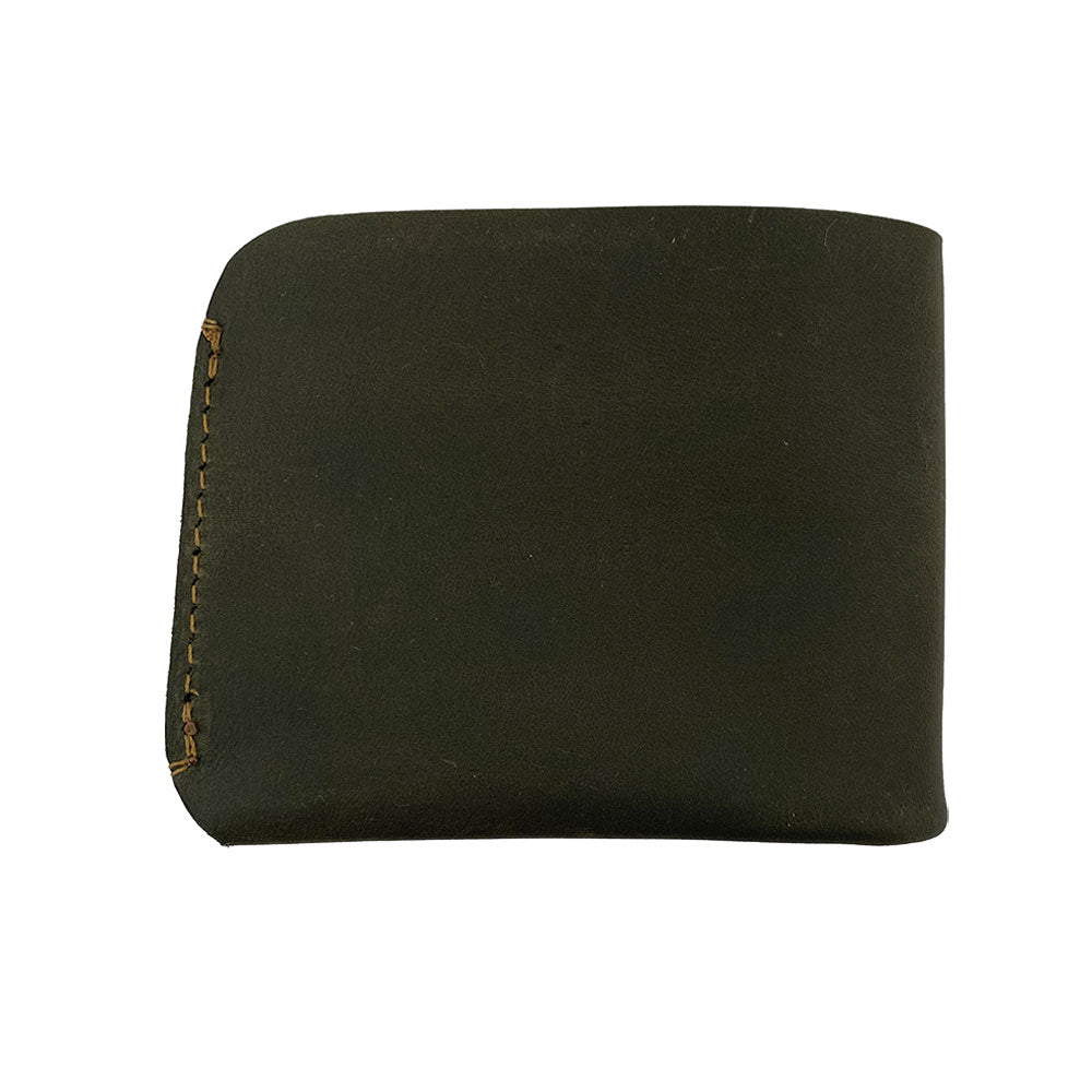 Close-up of the Hide & Drink Minimal Wallet's texture, highlighting the quality of Full Grain Leather. This Classic Slimfold Wallet functions as an efficient Card Organizer Holder and essential Travel Accessory, crafted through dedicated Small Batch Production techniques by artisans from La Antigua Guatemala & Oaxaca Mexico.