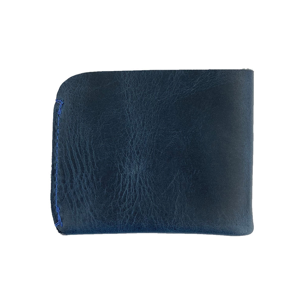 Side view of the Hide & Drink Minimal Wallet, featuring luxurious Full Grain Leather. This Classic Slimfold Wallet serves as a practical Card Organizer Holder, suitable as a Travel Accessory, showcasing the artistry of Small Batch Production by artisans in La Antigua Guatemala & Oaxaca Mexico with Hand Cut and Hand Sewn details.