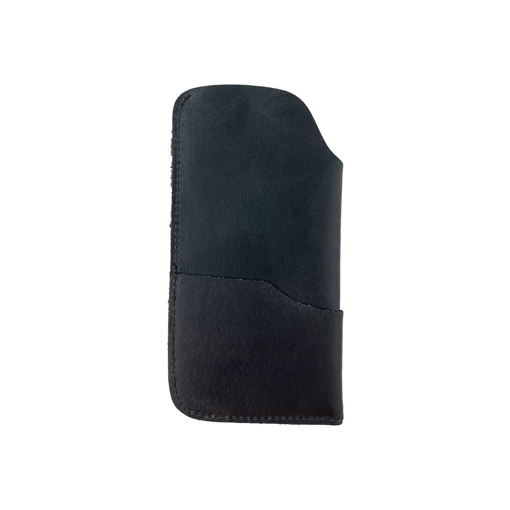 The Hide & Drink Sunglass Case & Wallet in sleek black leather, embodying rustic elegance. This Rustic Sunglasses Case & Wallet is crafted from Full Grain Leather, makes for a perfect glasses protector for travel, and is handmade in La Antigua Guatemala & Oaxaca Mexico.