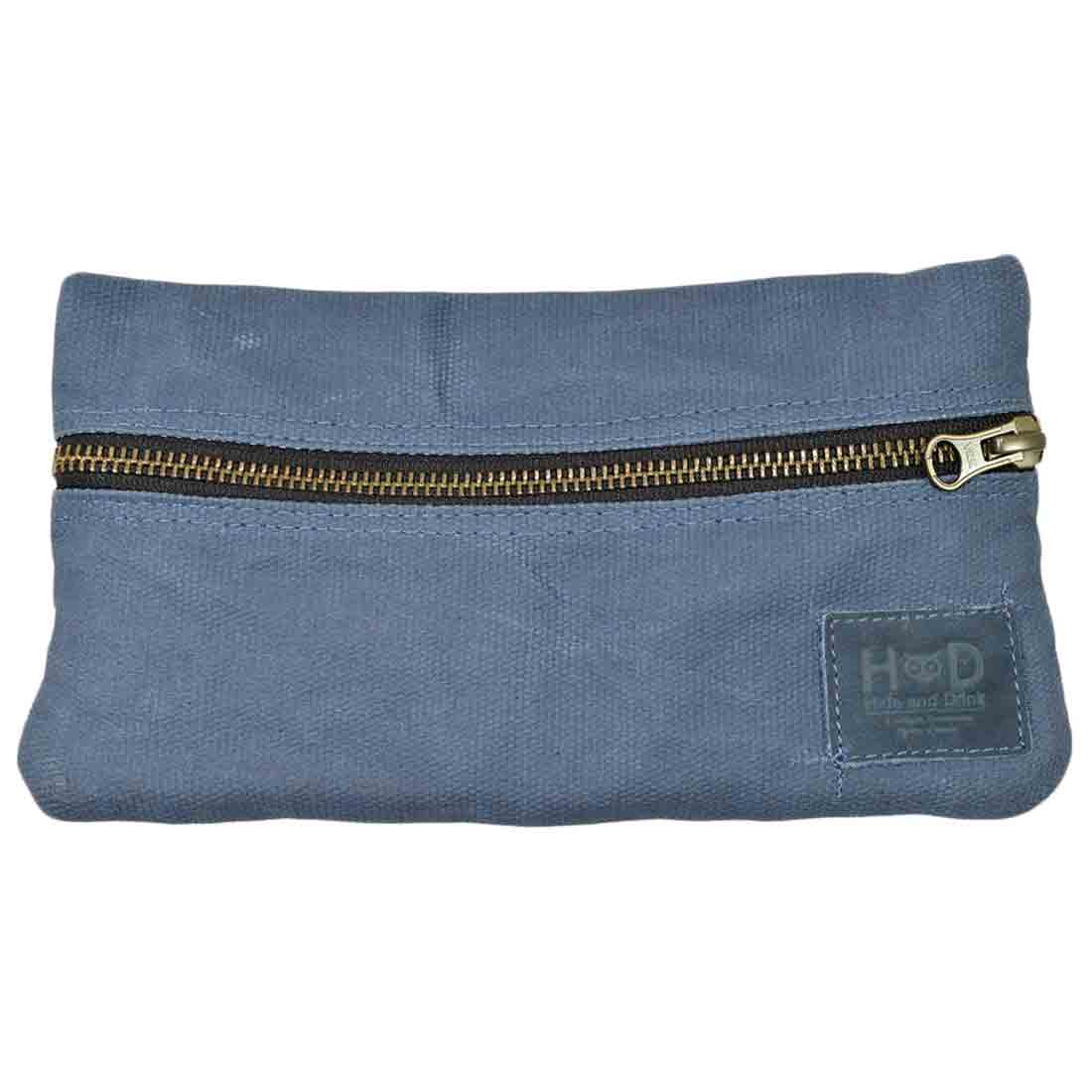 A closer look at the compact blue Hide & Drink Vape Pen Case (Accessories not included), showing its trustworthy zipper and craftsmanship. A perfect choice for Pen Accessories Kit Pouch Holder with secure fit features. G Pen Soft Travel Bag Handmade from Waxed Canvas, Full Grain Leather, StockyardX, Small Batch Production, Hand Cut, Hand Sewn, Fire Branded, Artisan, Handmade in La Antigua Guatemala & Oaxaca Mexico.
