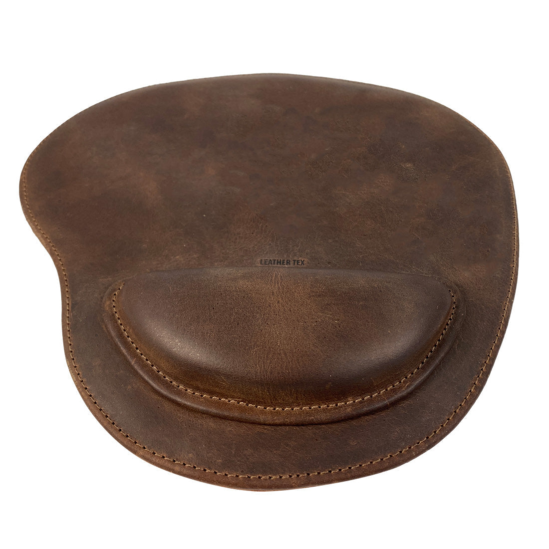 Another angle of the LeatherTex Rustic Oval Shape Mousepad, demonstrating its appeal with a rich leather finish and ergonomic wrist rest. This platform is perfect for computers, laptops, and Macs, blending functionality with style. Artisan-crafted in La Antigua Guatemala & Oaxaca Mexico.