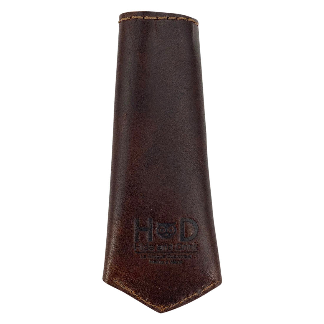 Hide & Drink Hot Pan Handle Cover showcasing the fire branded logo on premium full grain leather. This artisan-crafted cover combines functionality and elegance, handmade in La Antigua Guatemala & Oaxaca Mexico, ideal for cooking enthusiasts.
