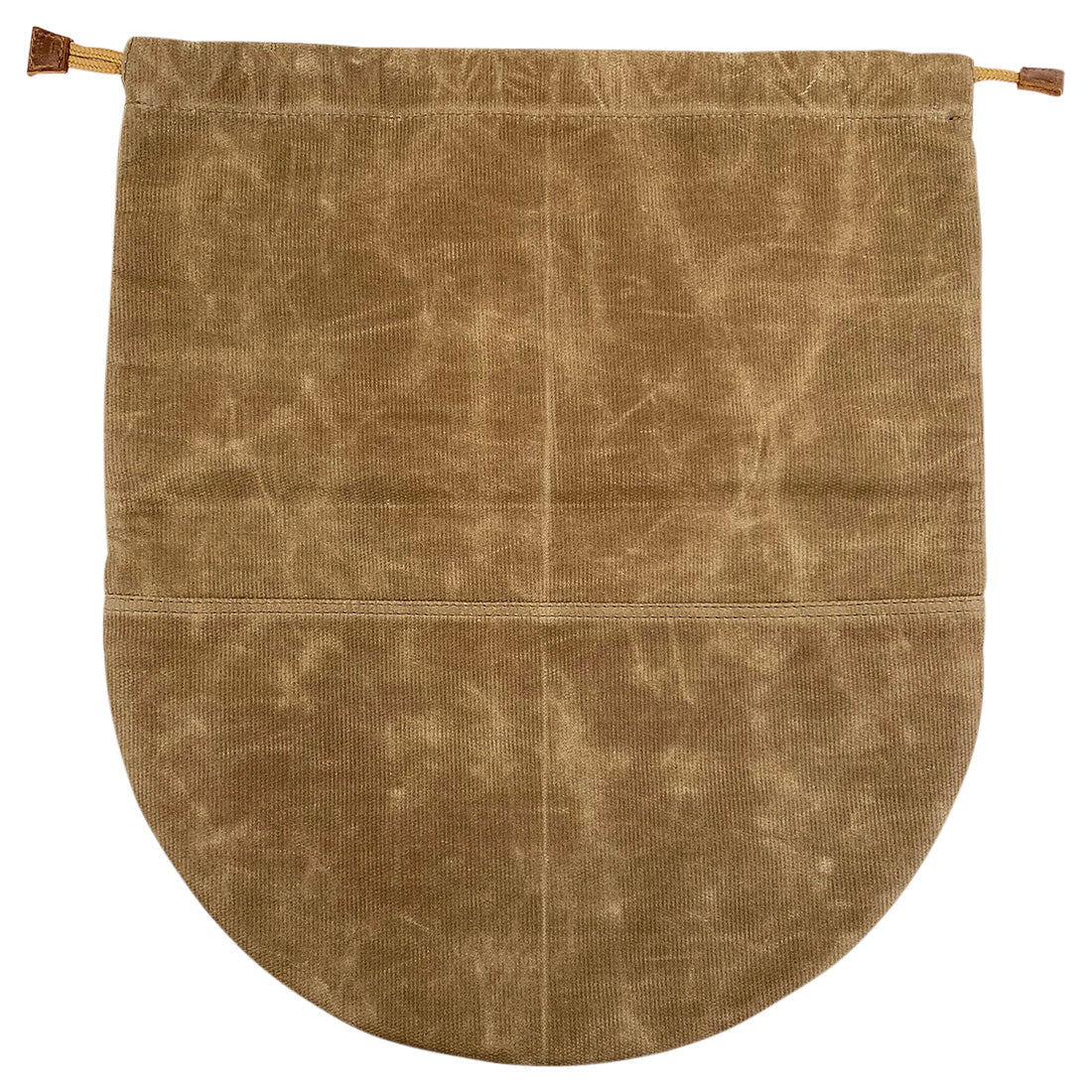 The Skillet Bag Cover by Hide & Drink displayed flat, showcasing its simple yet effective design. Made from waxed canvas, this case for skillet without nonstick coating features artisan craftsmanship, with hand cut and hand sewn details, handmade in La Antigua Guatemala and Oaxaca Mexico.
