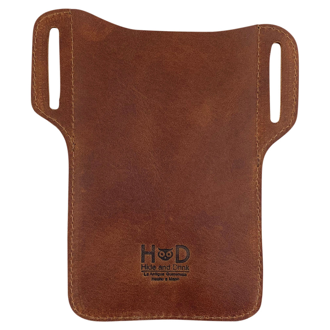 Back view of the Hide & Drink Tactical iPhone 13/14 Pro Case, showcasing its rustic design and fire branded logo. This handmade case is created from high-quality full grain leather and is ideal for keeping your iPhone 13/14 Pro Max secure and accessible, emphasizing artisan craftsmanship.