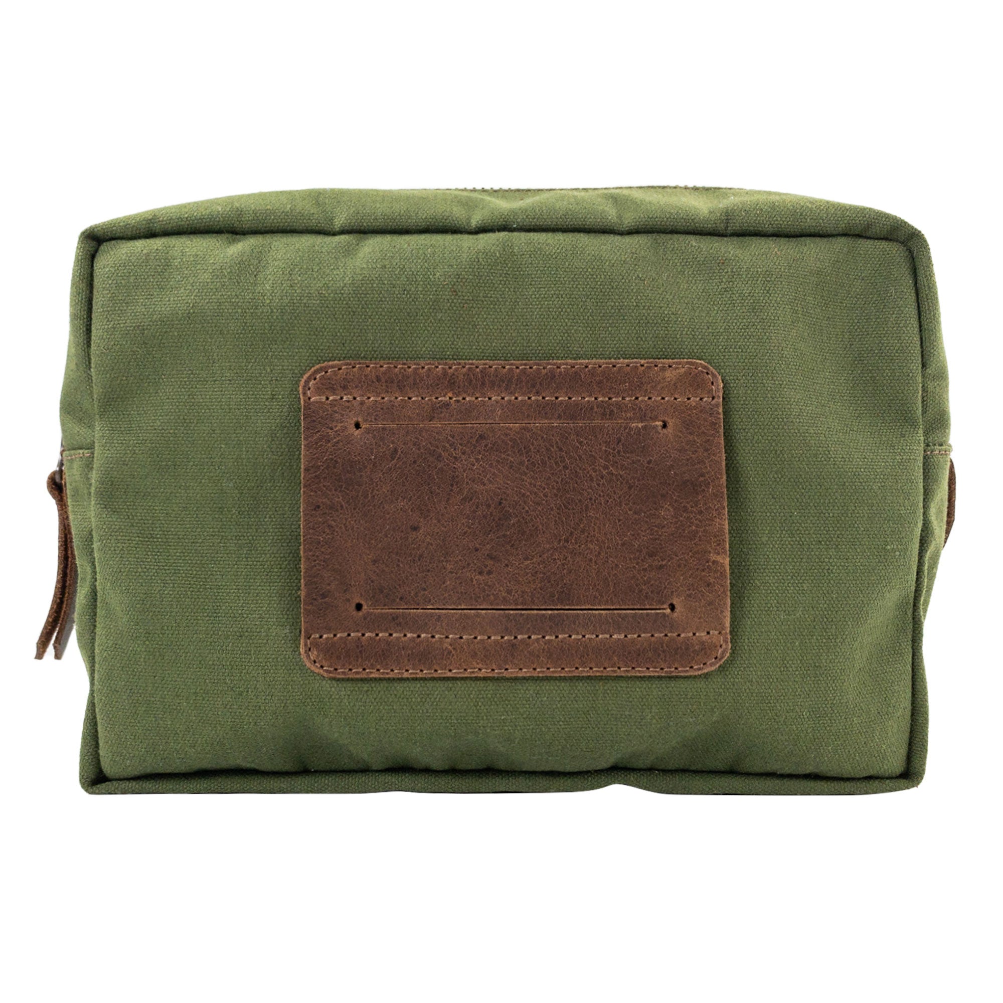 Back view of the Rectangular Utility Bag for Camping by Valhalla Gear, featuring a leather patch and sturdy design, made from water-resistant canvas and full grain leather, artisan-crafted in La Antigua Guatemala.