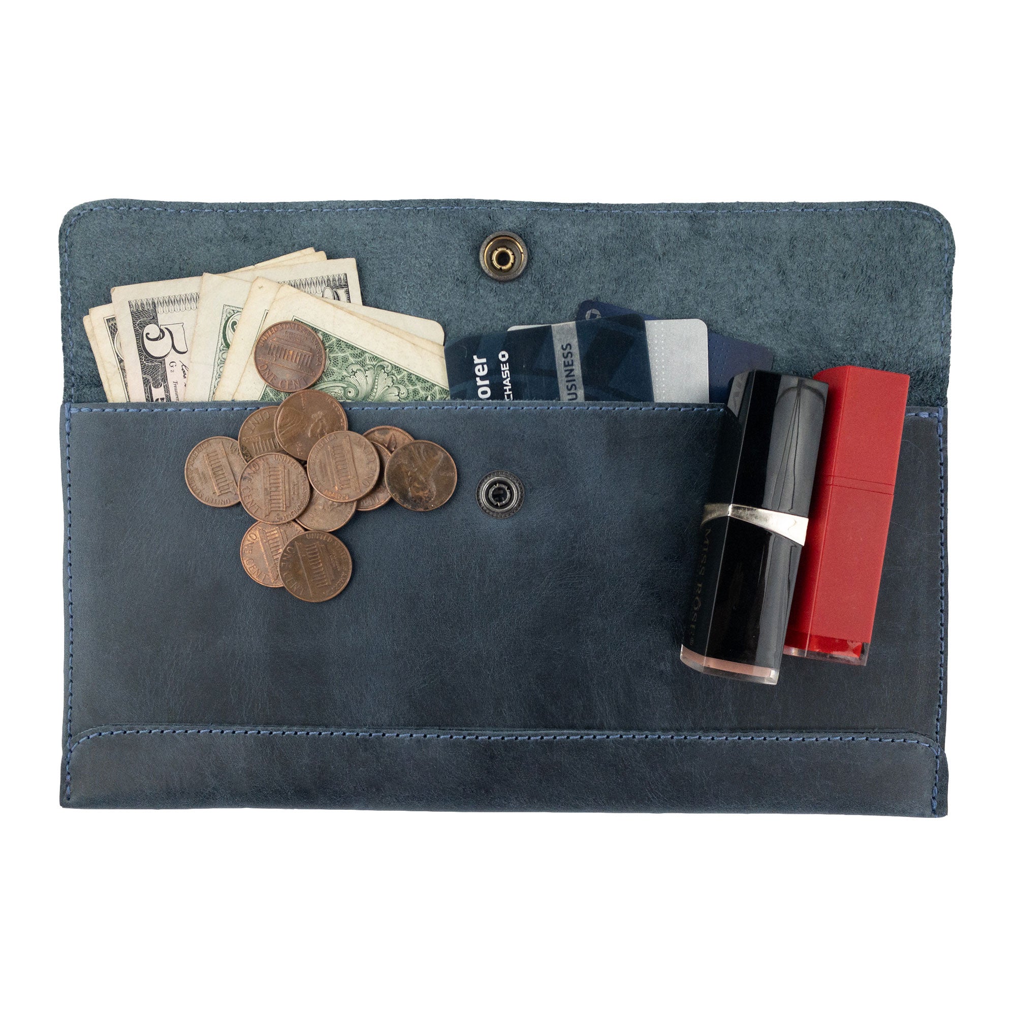 Front view of Hide & Drink's navy blue Travel Hand Wallet, featuring a stylish closure and exquisite Full Grain Leather texture. This Travel Wallet is expertly crafted through Small Batch Production in La Antigua Guatemala & Oaxaca Mexico.