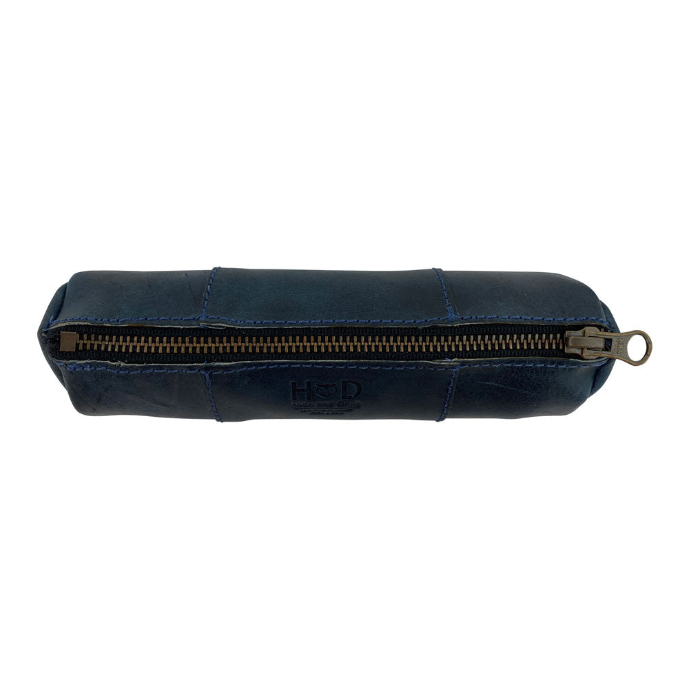Side view of the Utility Cylinder Case by Hide & Drink featuring a strong zipper for secure storage. This elegant, handmade bag is perfect for cables or personal items, emphasizing Full Grain Leather craftsmanship. Cylinder Case, Rustic, Artisan.