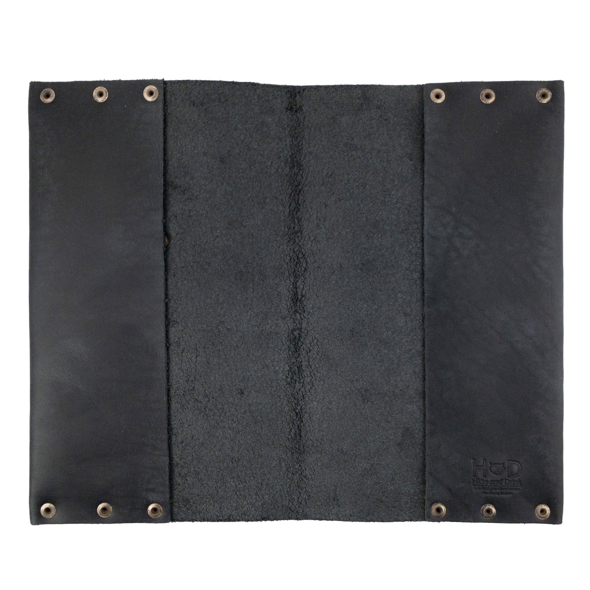 Detailed view of Hide & Drink's Riveted Journal Cover (5 x 8.50 in.), showing the soft interior finish of the full grain leather. This artisan-made cover is a perfect fit for your notebook and represents a fine example of handmade craftsmanship from La Antigua Guatemala. Discover the Riveted Journal Cover for Notebook (5 x 8.50 in.) (Notebook Not Included), a unique blend of classic sleeve style and durable materials.