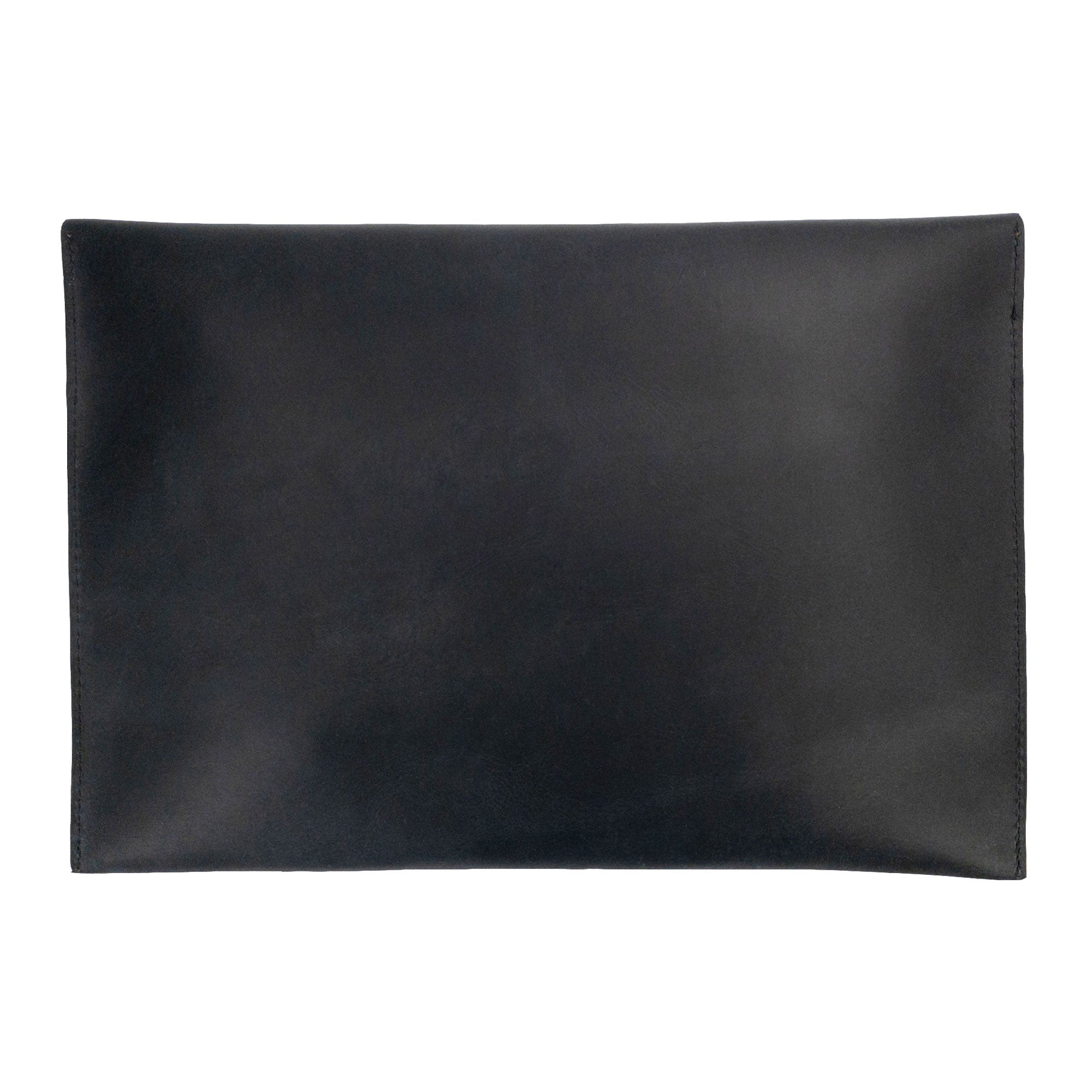 The back of the Hide & Drink MacBook Slim Case in black, illustrating its elegant minimalist design. Crafted for MacBook Air/Pro 13 Inch with M1 Chip, this case balances style and functionality with its artisan craftsmanship, made from top-quality full grain leather.