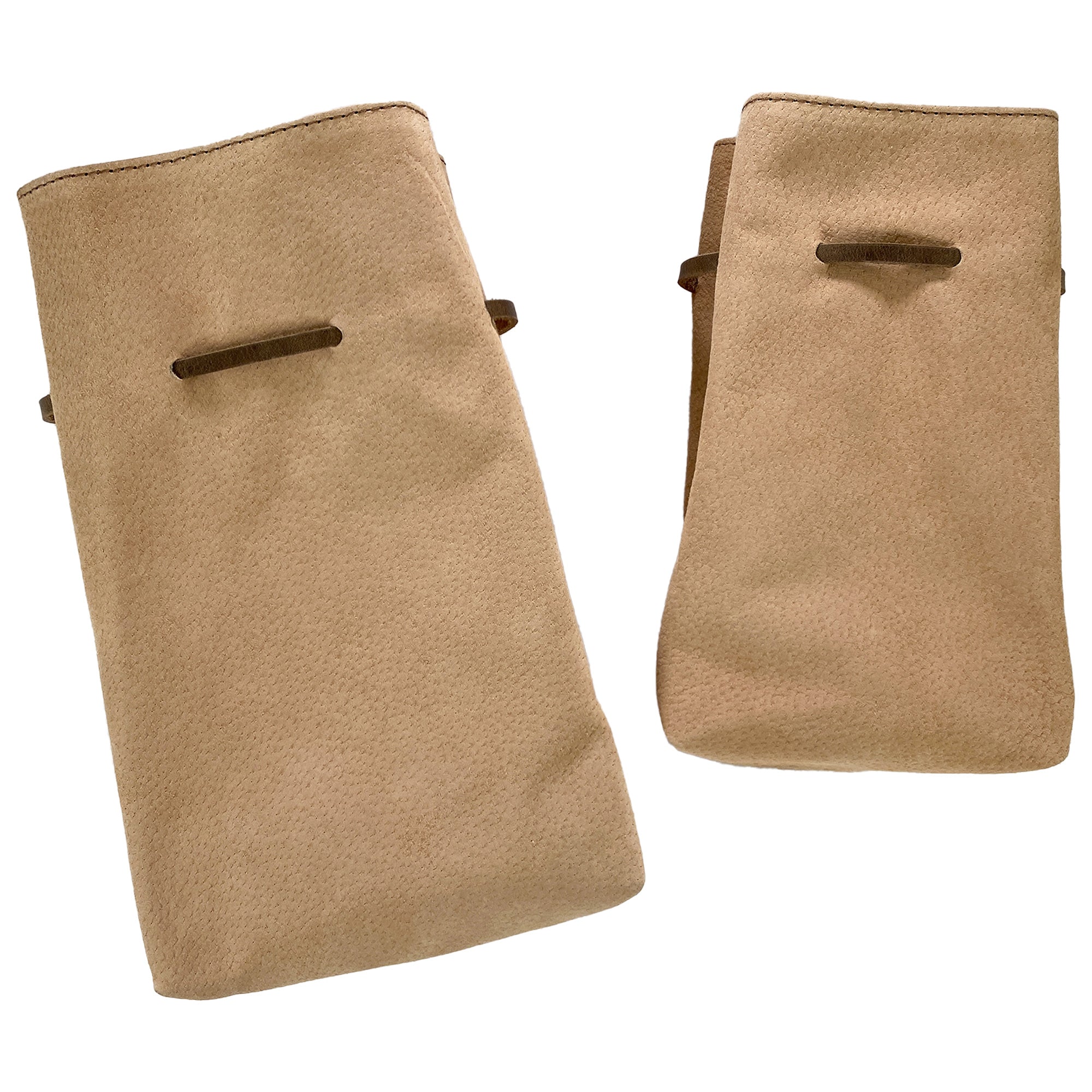 Close-up of Hide & Drink's Drawstring Sack (2 pack) emphasizing the unique texture and finish of the sheepskin leather. A stylish choice for multiple uses. Drawstring Sack (2 pack) Handmade from Sheepskin and Full Grain Leather, StockyardX, Small Batch Production, Hand Cut, Hand Sewn, Fire Branded, Artisan, Handmade in La Antigua Guatemala & Oaxaca Mexico.