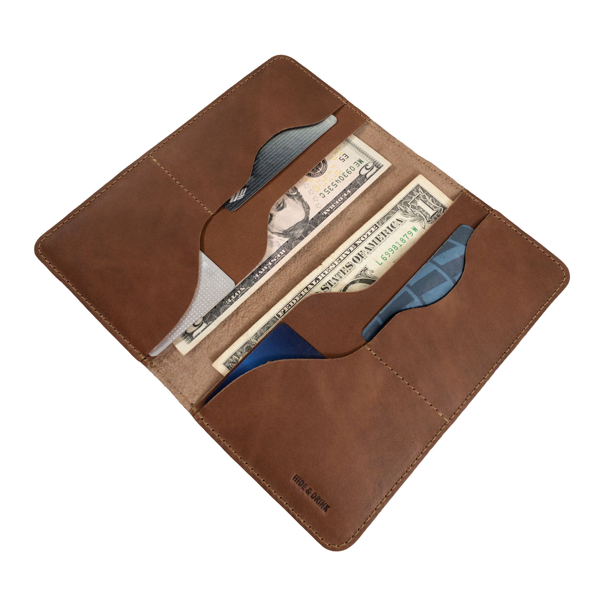 Hide & Drink Large Organizer Wallet focusing on the craftsmanship of the card slots and leather quality. This artisan-made bifold wallet serves as a perfect travel accessory, crafted with care from full grain leather in La Antigua Guatemala & Oaxaca Mexico.