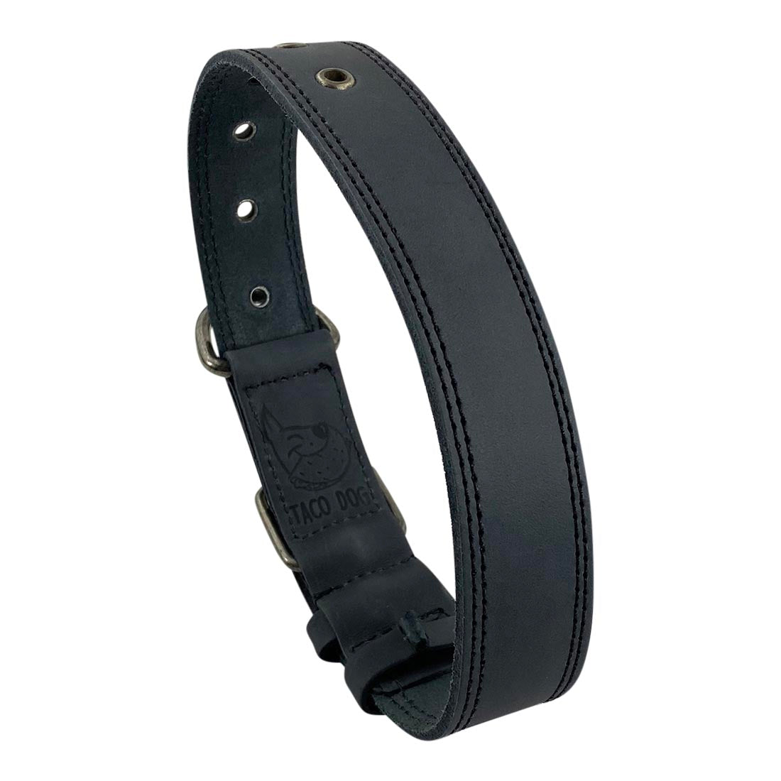Top-down view of Taco Dog Black Leather Dog Collar demonstrating its stylish silhouette, suitable for medium to large dogs. Features heavy-duty adjustable buckle and metal D ring, artisan-made in La Antigua Guatemala.