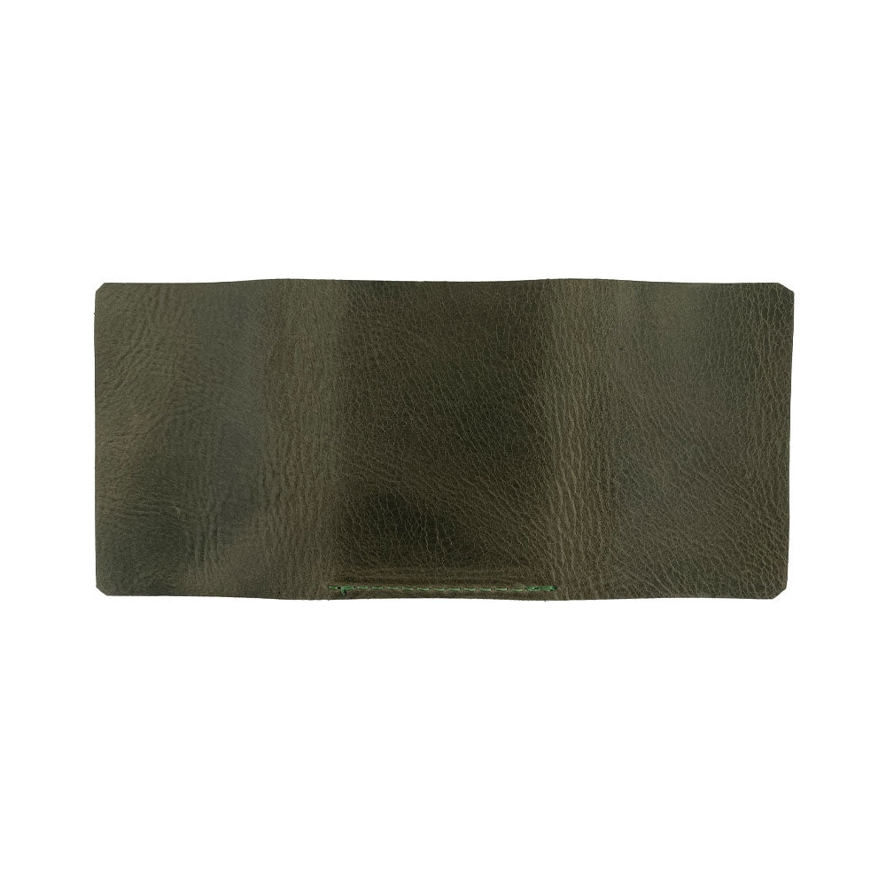 The Hide & Drink Minimalist Wallet Bills Only showcasing a close-up of its leather craftsmanship. Made from superior Full Grain Leather, this Ultra Minimalist Wallet is a great cash organizer reflective of artisan dedication and small batch production.