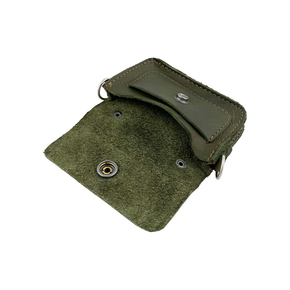 Hide & Drink's Card Holder Briefcase Style, featuring a Mini Briefcase Card Holder filled with various cards. This Full Grain Leather case is handcrafted to hold up to 10 cards and folded bills, making it an effective cash organizer with artisan craftsmanship.