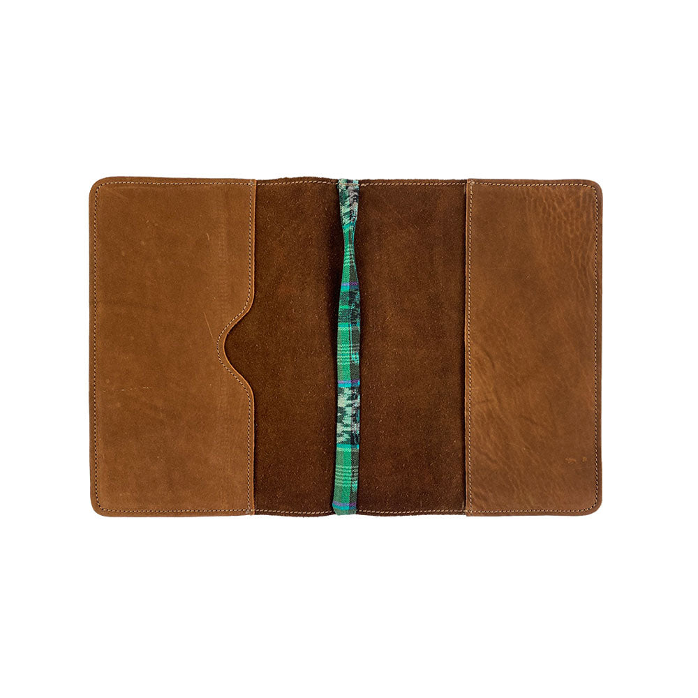 Front view of the sleek black leather Full Grain Leather Journal Cover for Moleskine Cahier XL (7.5 x 9.75 in.) by Hide & Drink. An elegant and modern design ideal for all writing enthusiasts.