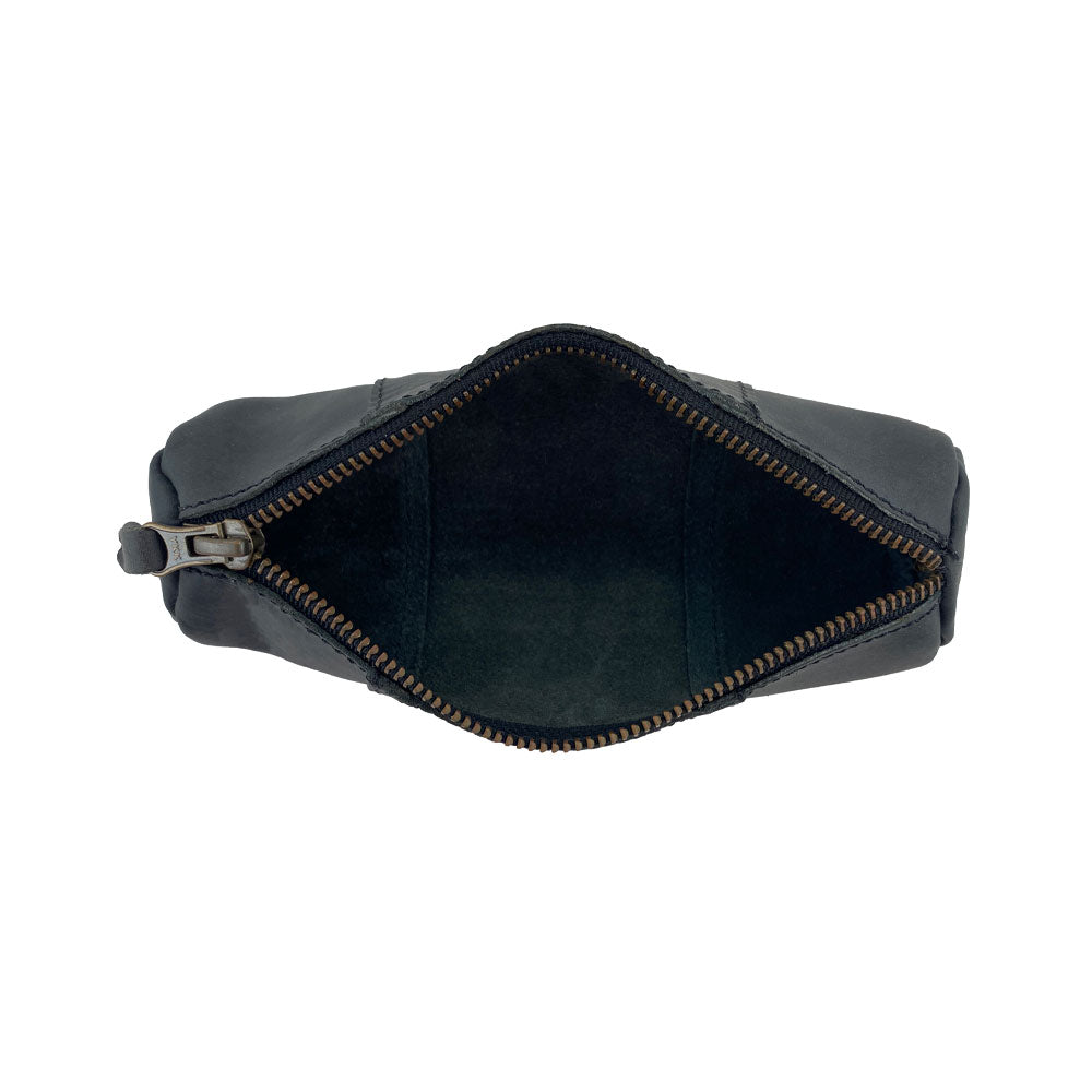 Inside view of the Utility Cylinder Case by Hide & Drink, featuring a spacious interior ideal for organizing cables and personal items. This artisan bag, crafted from Full Grain Leather, embodies rustic style. Cylinder Case, Classic Bag, Handmade.