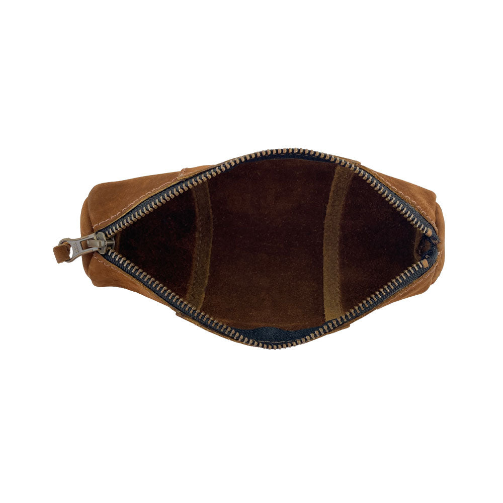 Inside view of the Utility Cylinder Case by Hide & Drink, featuring ample space for organizing cables and personal items. This rustic design is crafted in small batches from Full Grain Leather. Cylinder Case, Handmade, Classic Bag.