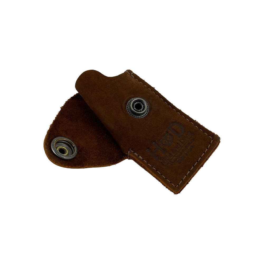 Open view of the Hide & Drink Lighter Protective Case revealing its interior and rich full grain leather texture, perfect for everyday use. Handmade in La Antigua Guatemala & Oaxaca Mexico by skilled artisans. Keywords: Lighter Protective Case, Full Grain Leather, Artisan.