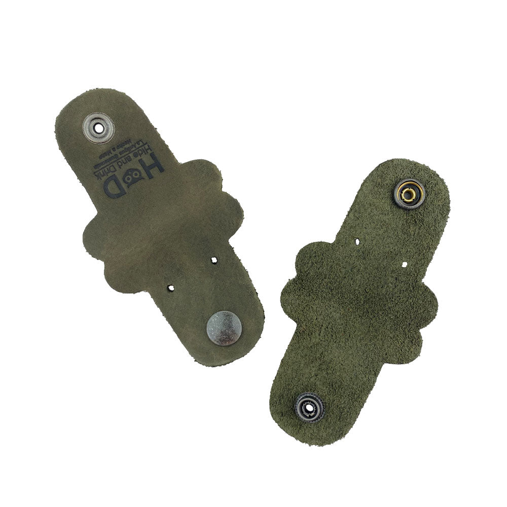 Back view of two green Dog Shaped Cord Keepers showing the snap feature, expertly crafted by Hide & Drink from Full Grain Leather. Dog Shaped Cord Keeper (Cord Clam) 2-Pack, Full Grain Leather, StockyardX, Small Batch Production, Hand Cut, Hand Sewn, Fire Branded, Artisan, Handmade in La Antigua Guatemala & Oaxaca Mexico.